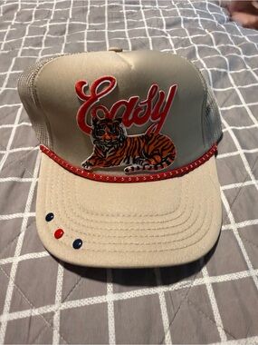 “Easy” Tiger Embroidered Trucker Hat – Beige – Red Studded Brim – Adjustable
